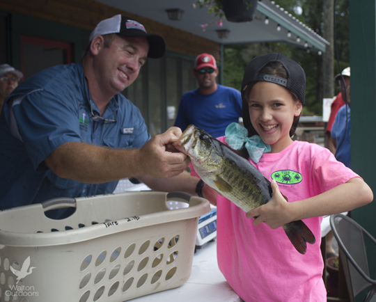 Reagan Wells of DeFuniak Springs and her 2.75 lb. bass was a big hit in the non-bream species division. Meagan won the lady angler division. Lori Ceier/Walton Outdoors